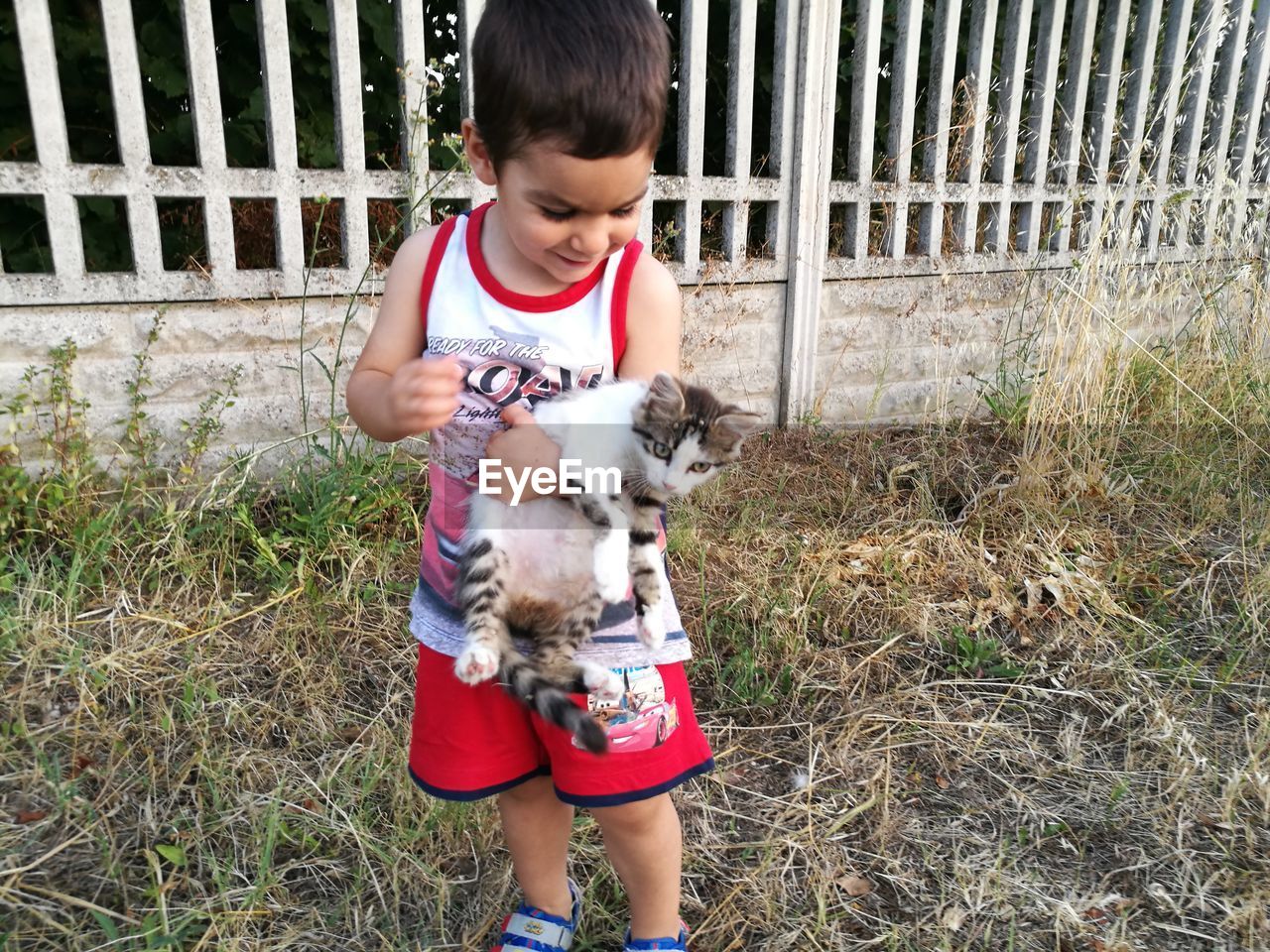 BOY WITH DOG