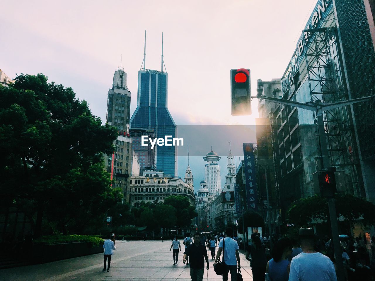 GROUP OF PEOPLE IN CITY