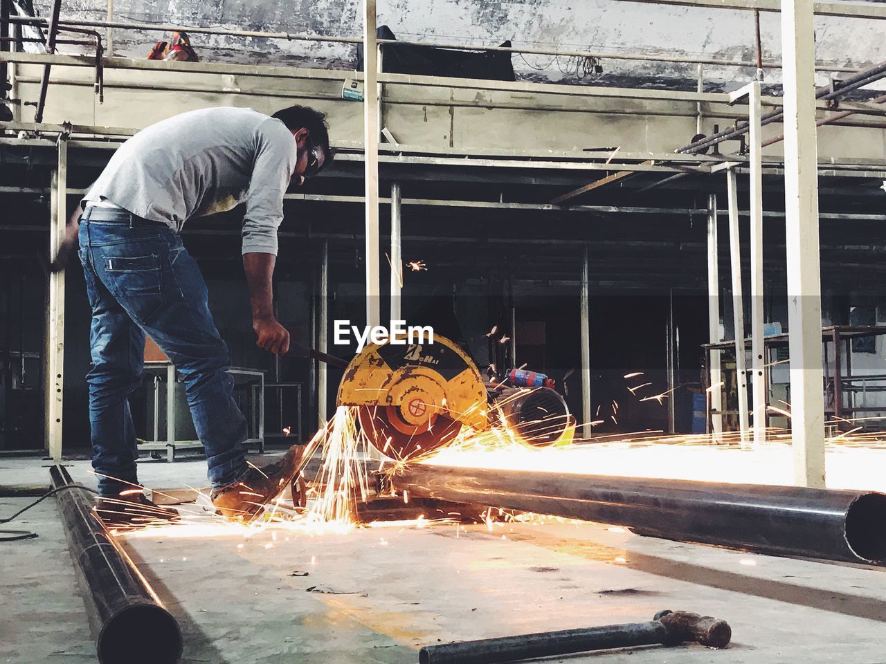 MAN WORKING AT SHOPPING MALL