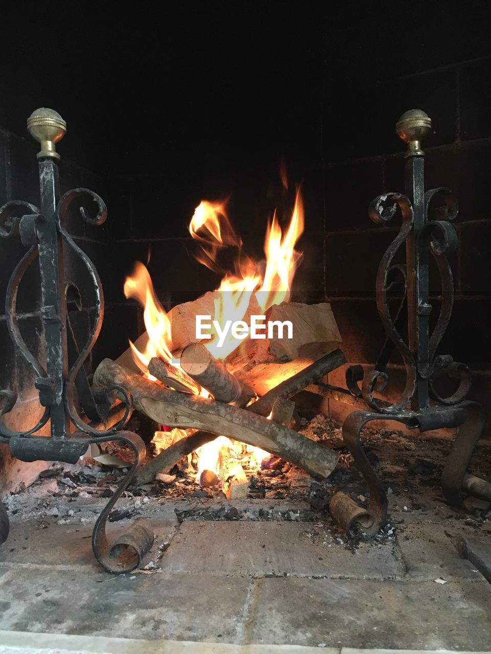 Wood burning at fireplace