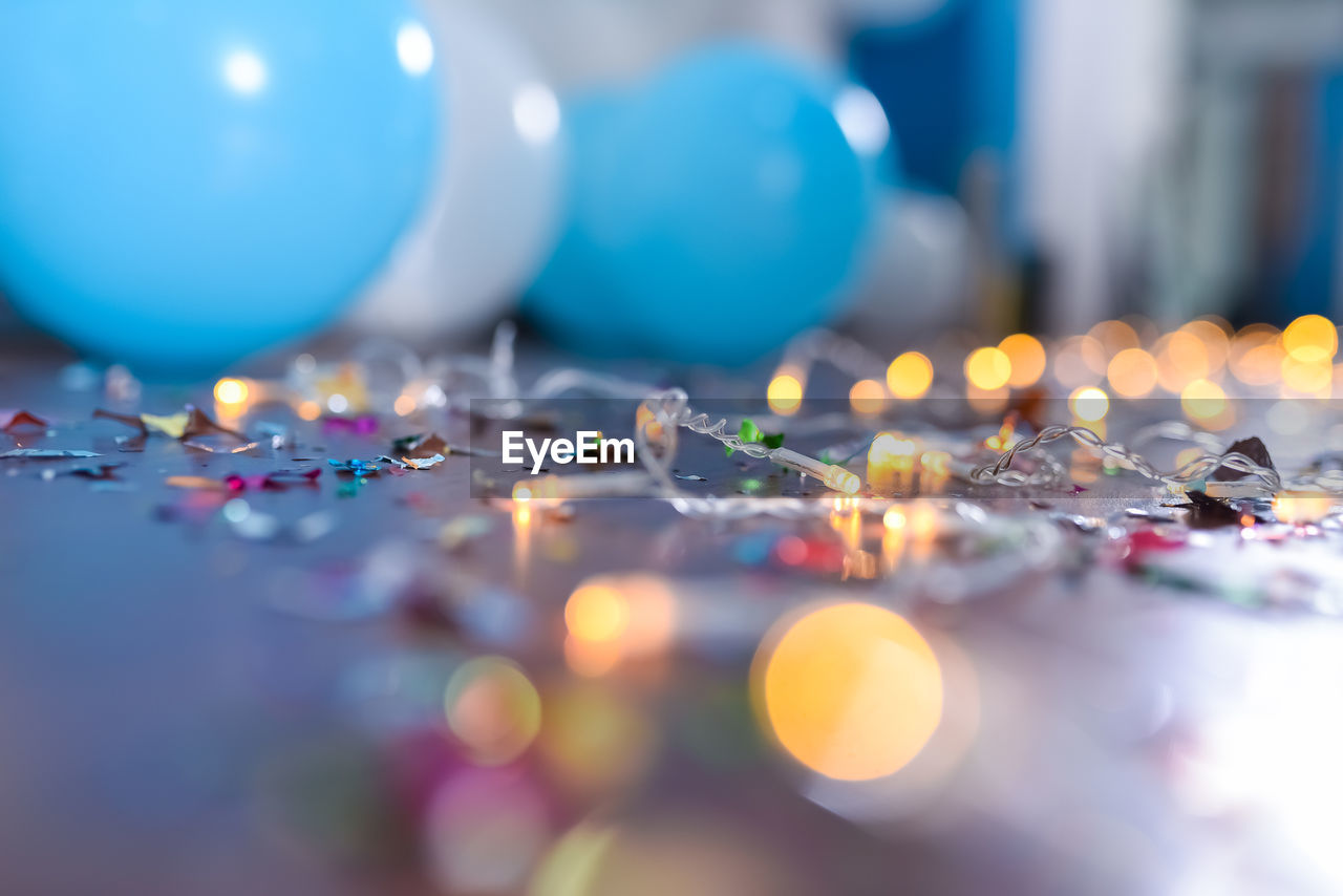 CLOSE-UP OF ILLUMINATED BALLOONS