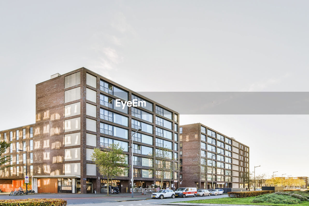 MODERN BUILDING AGAINST SKY