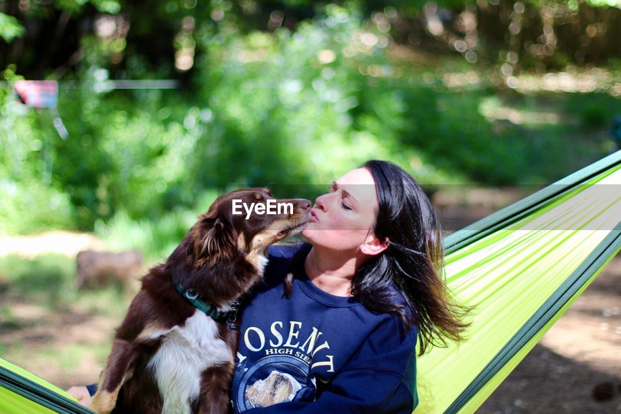 Portrait of woman with dog