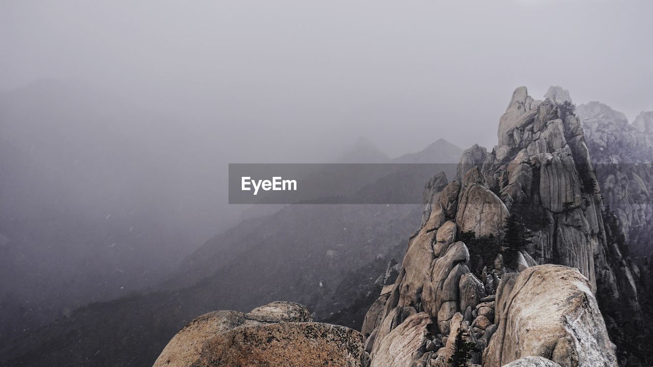 Panoramic view of mountain range against sky
