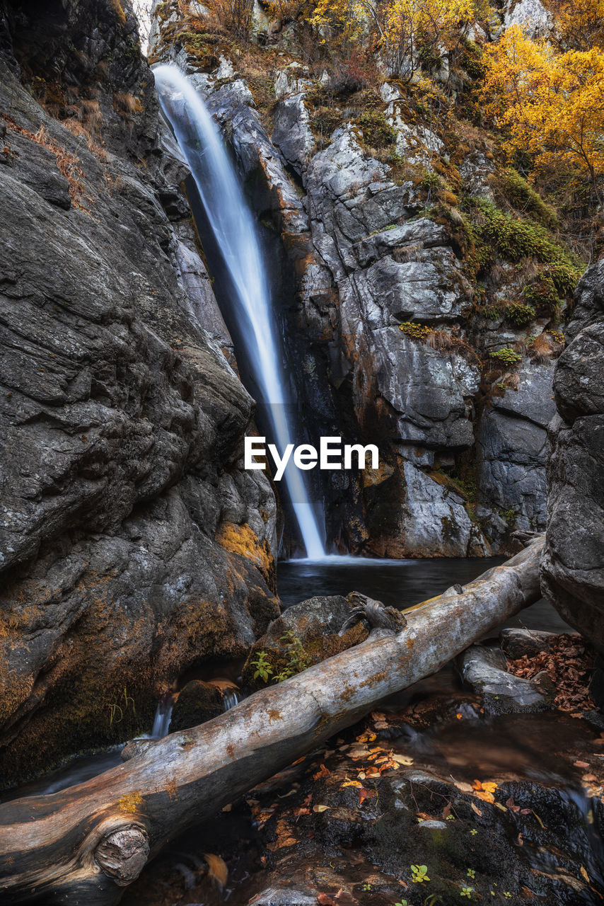 SCENIC VIEW OF WATERFALL