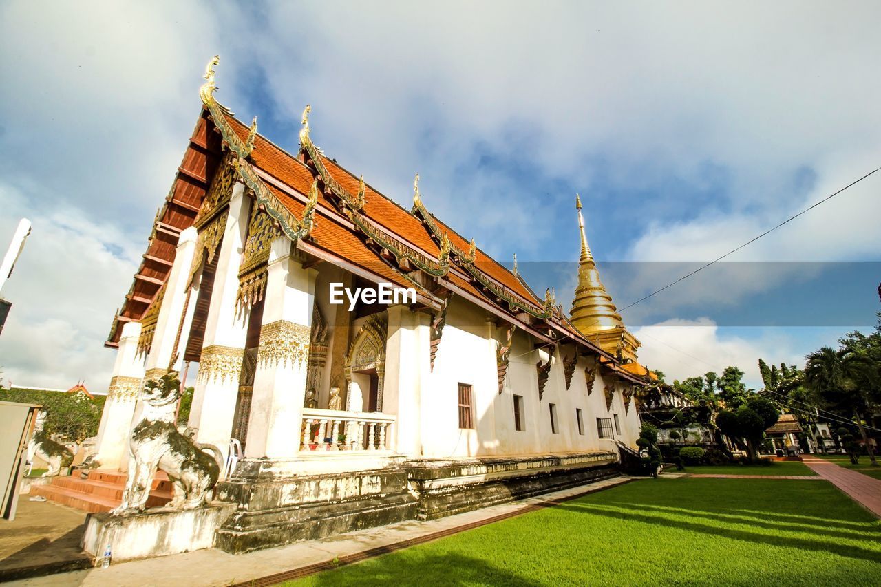 TEMPLE AGAINST BUILDING