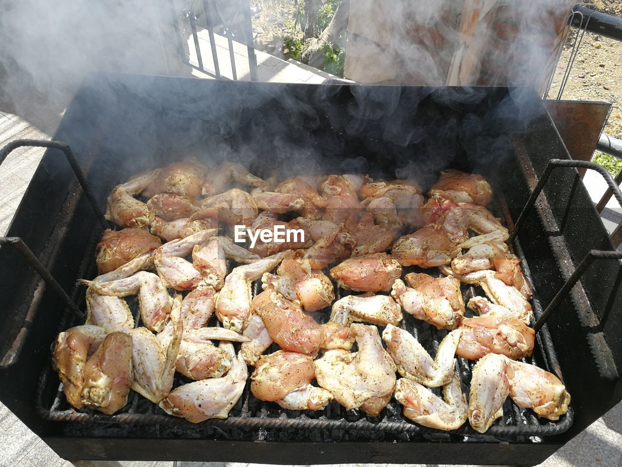 MEAT ON BARBECUE GRILL