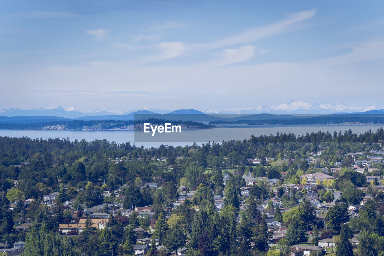 Panoramic view of town against sky