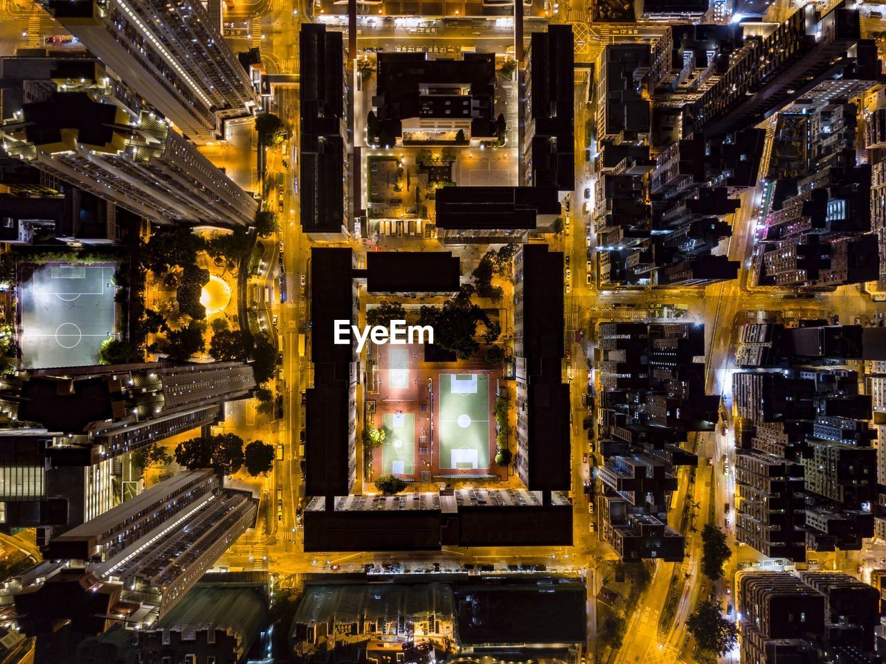 High angle view of illuminated buildings at night