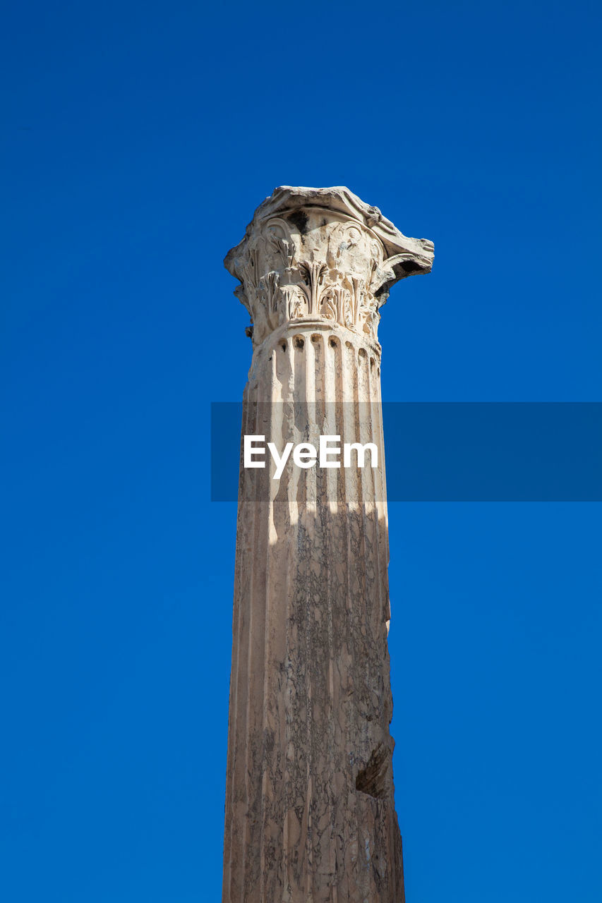 Ruins of the hadrian library at the center of the athens city in greece