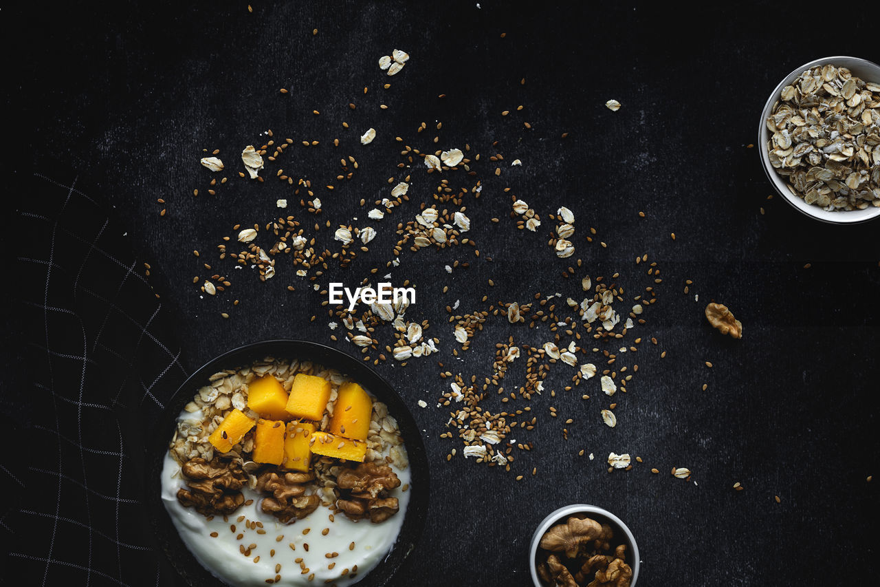 HIGH ANGLE VIEW OF BREAKFAST IN BOWL ON TABLE