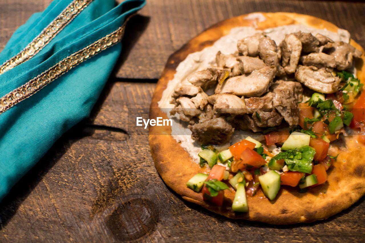 CLOSE-UP OF FOOD ON TABLE