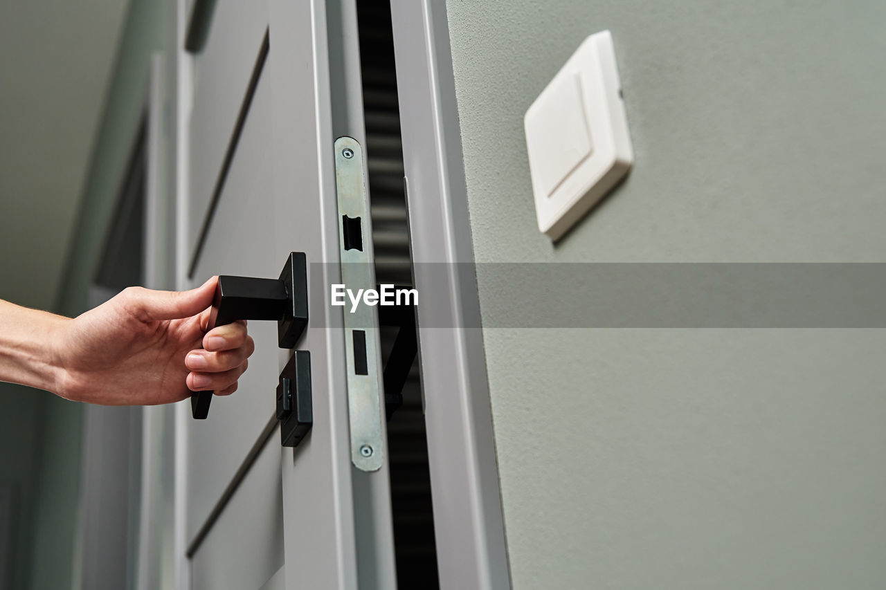 Woman open door and entrance in the room