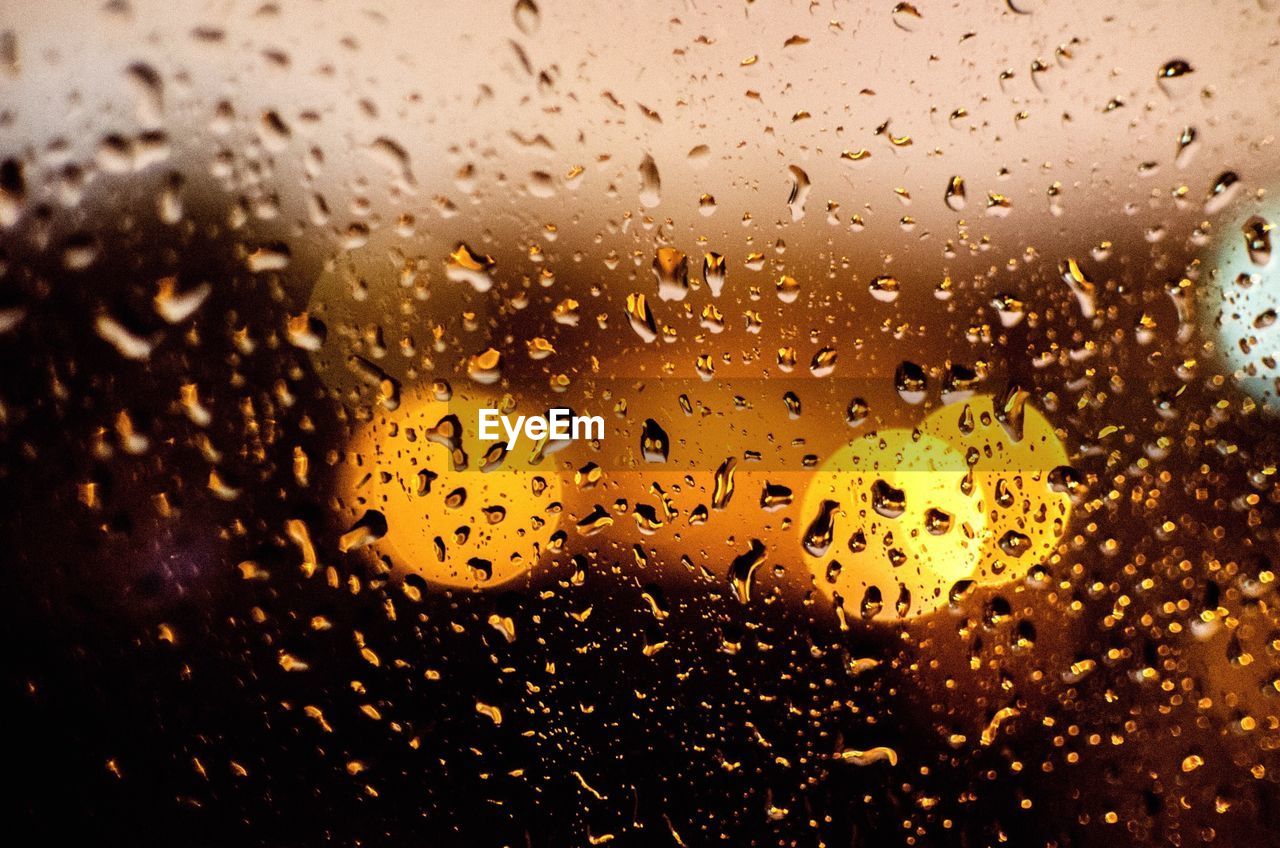 Close-up of water drops on glass window