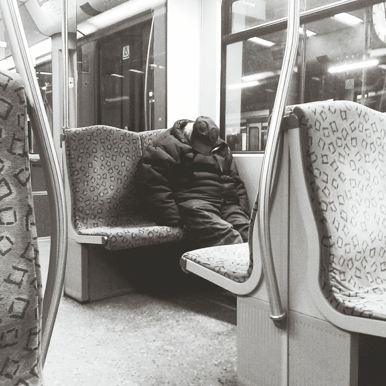 Man sleeping in train