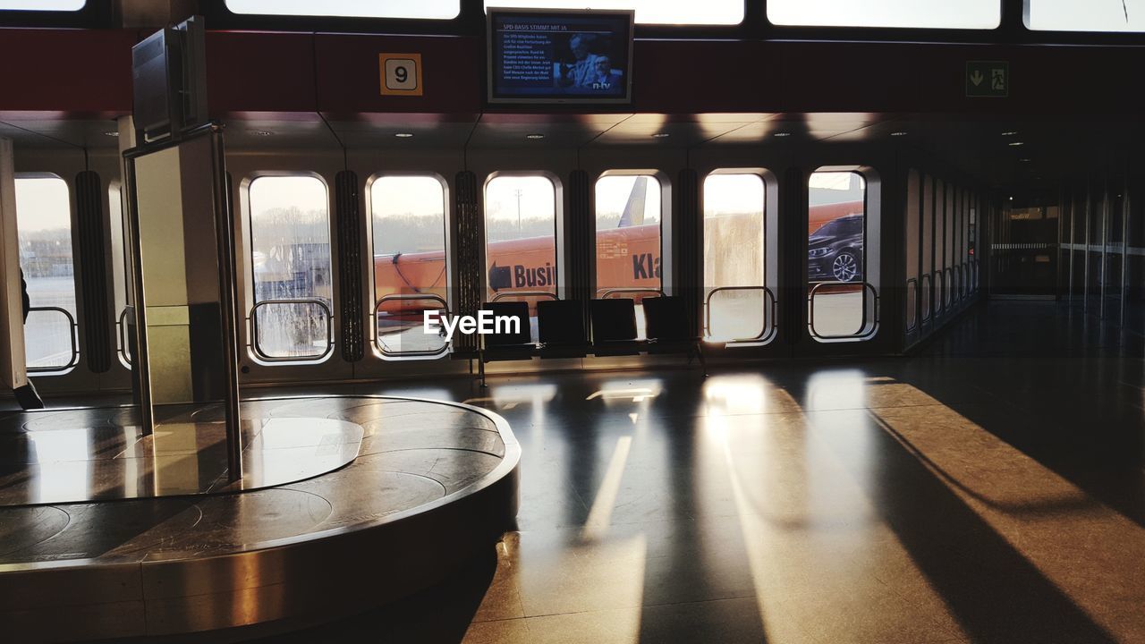 TRAIN AT WINDOW OF RAILROAD STATION