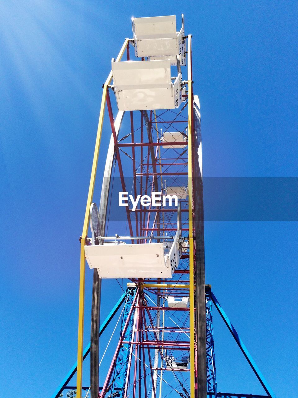 LOW ANGLE VIEW OF ELECTRICITY PYLON