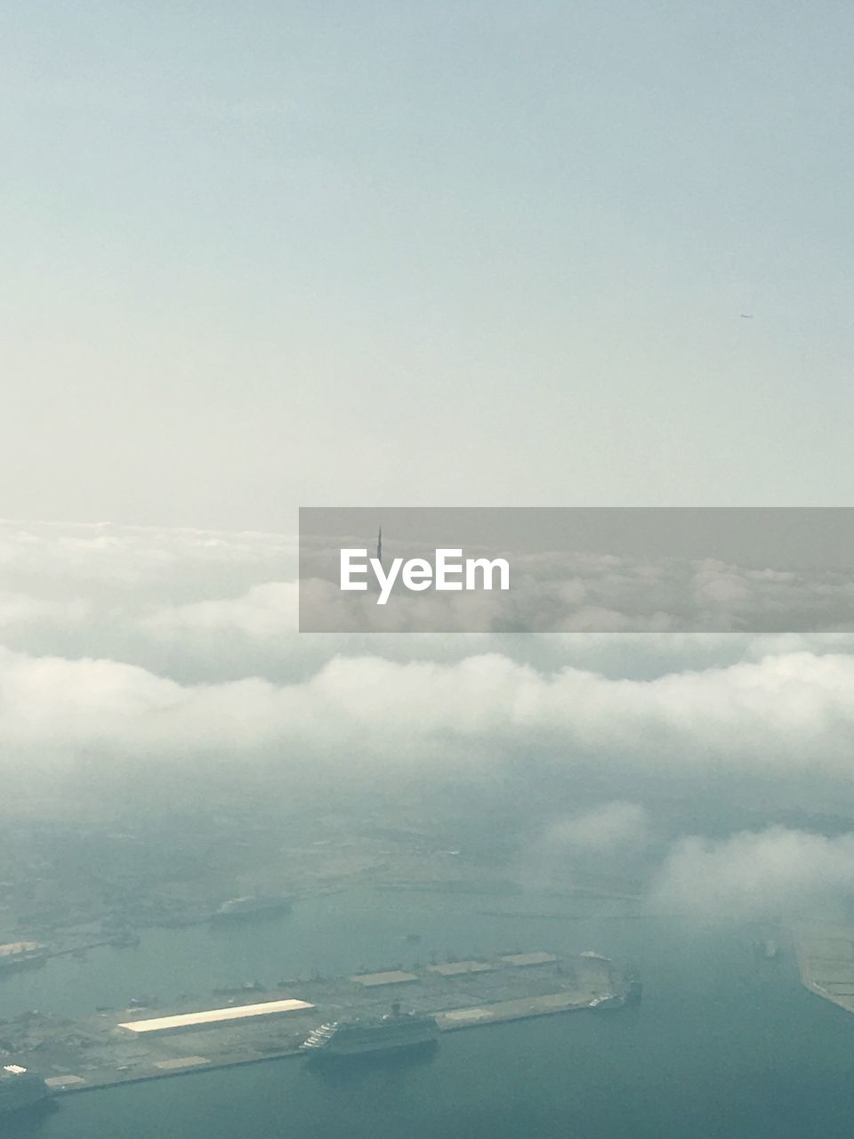 Aerial view of burj khalifa amidst cloud