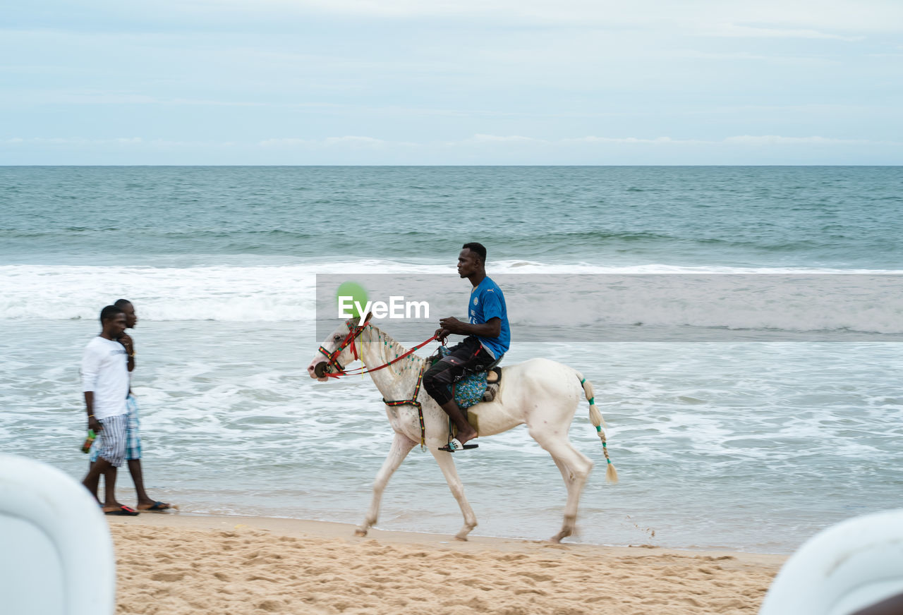 PEOPLE ON BEACH