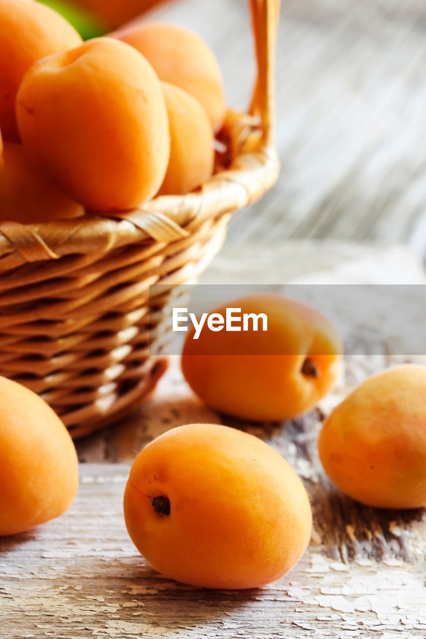 Close-up of apricots on table