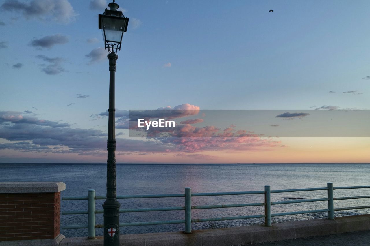 SCENIC VIEW OF SEA DURING SUNSET