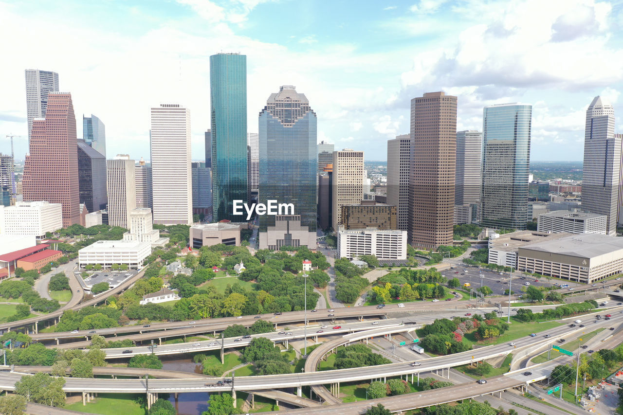 AERIAL VIEW OF MODERN BUILDINGS IN CITY