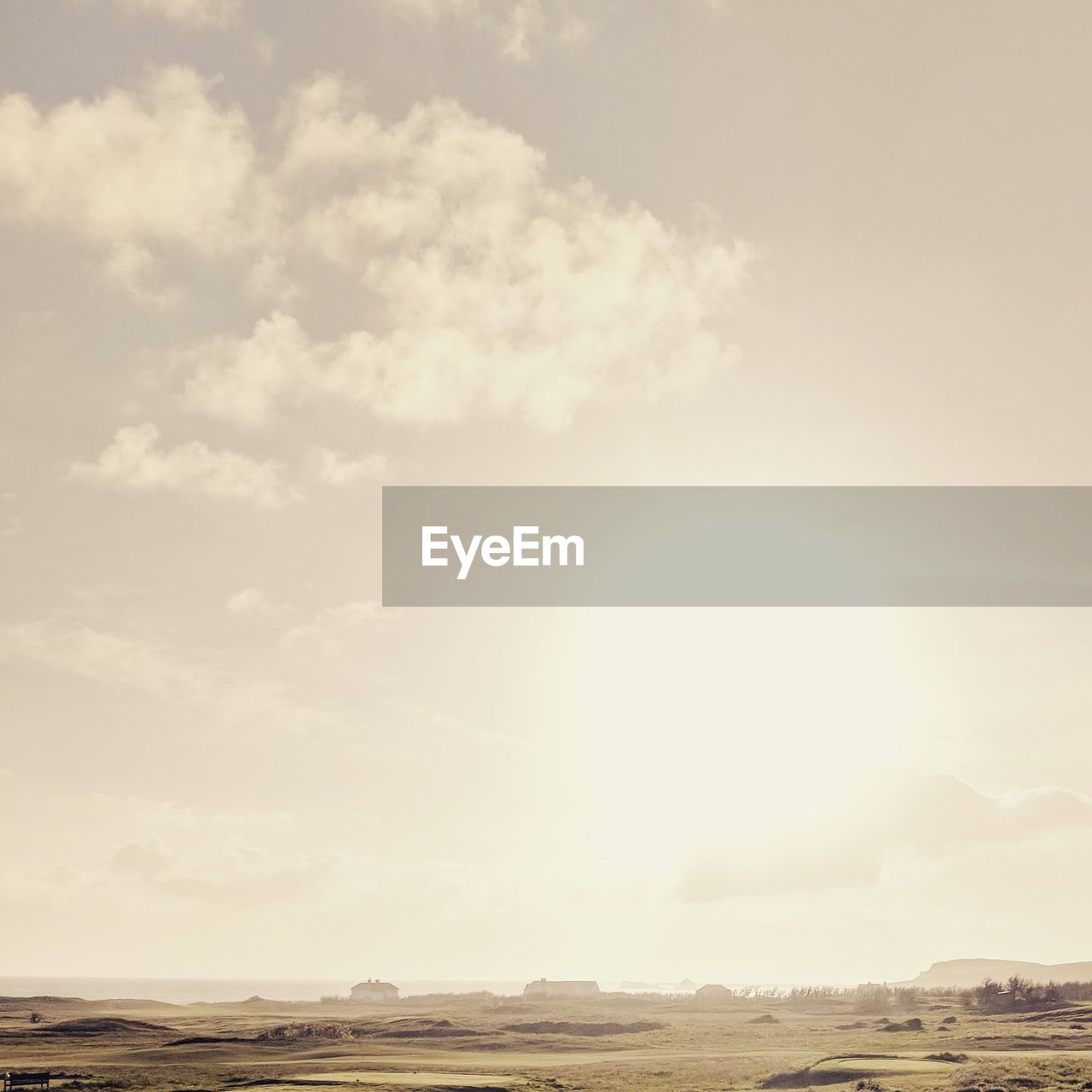 SCENIC VIEW OF SKY OVER LAND AGAINST CLOUDY DAY