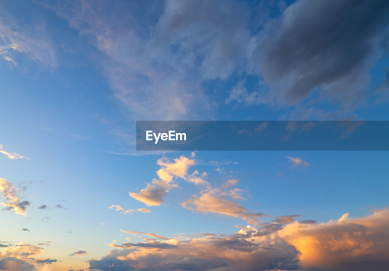 LOW ANGLE VIEW OF CLOUDS IN SKY AT SUNSET