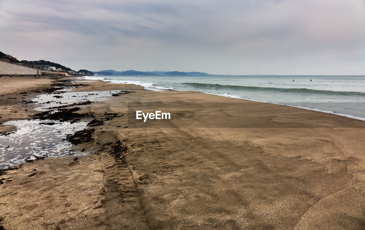 Scenic view of beach against sky