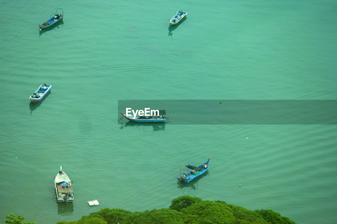 High angle view of boats moored in sea