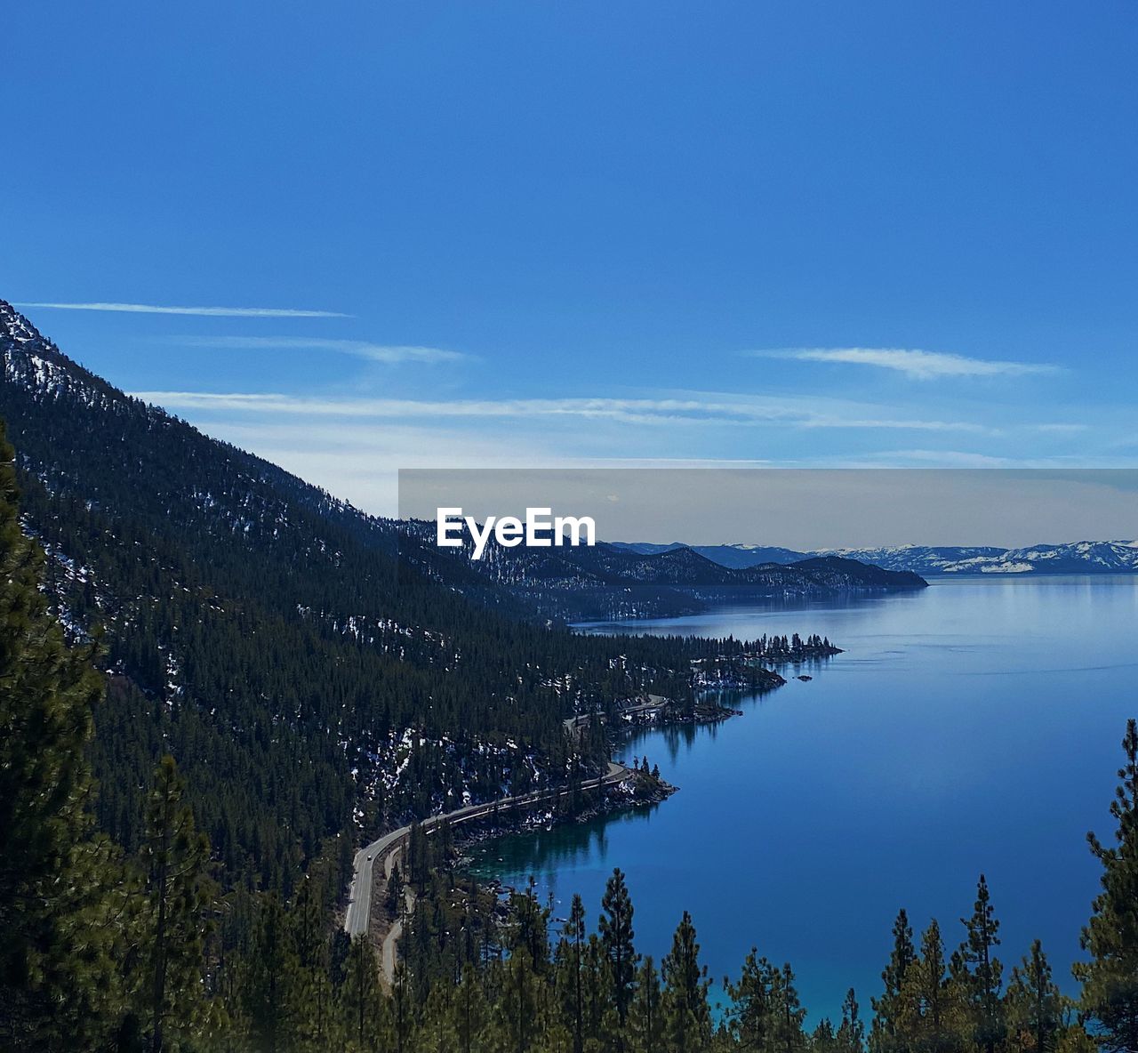 SCENIC VIEW OF LAKE AGAINST BLUE SKY