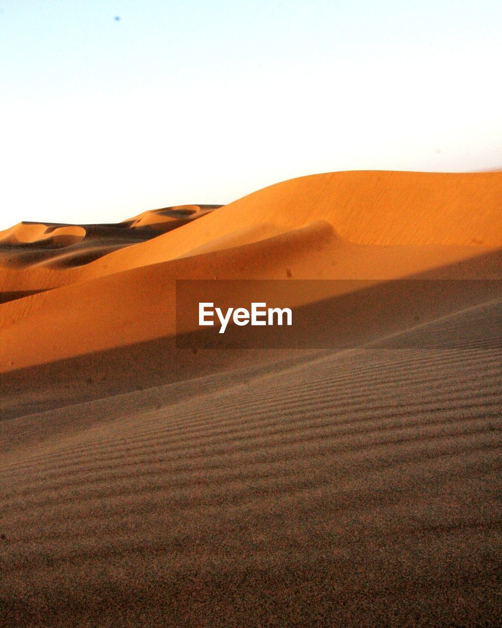 SCENIC VIEW OF ARID LANDSCAPE AGAINST CLEAR SKY