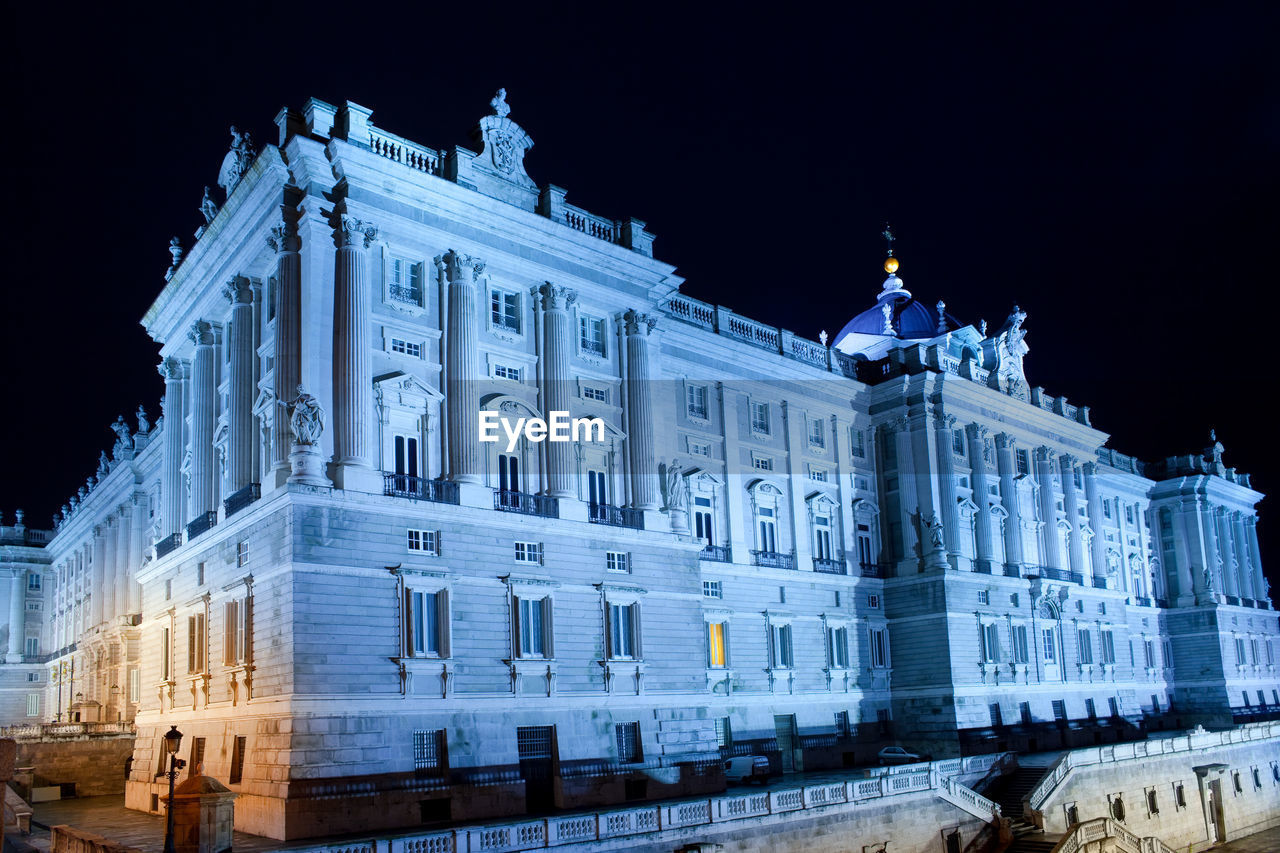 A night view of palacio real, royal palace, at plaza de oriente, madrid, spain