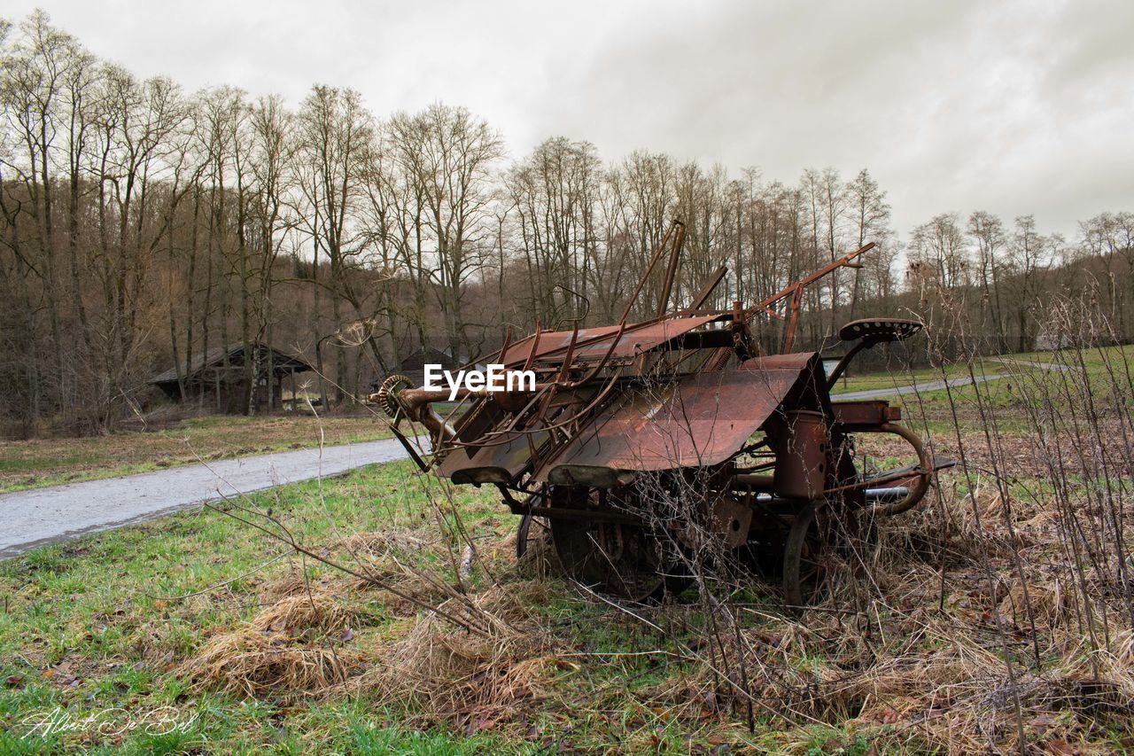 ABANDONED CART ON FIELD