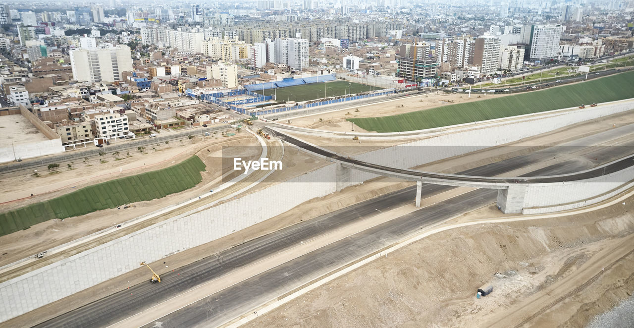 High angle view of road amidst buildings in city