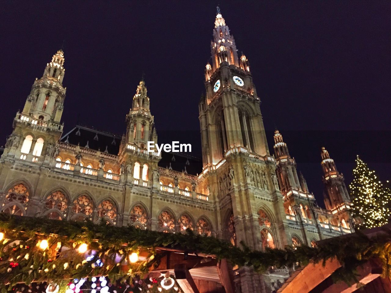 LOW ANGLE VIEW OF TEMPLE AT NIGHT