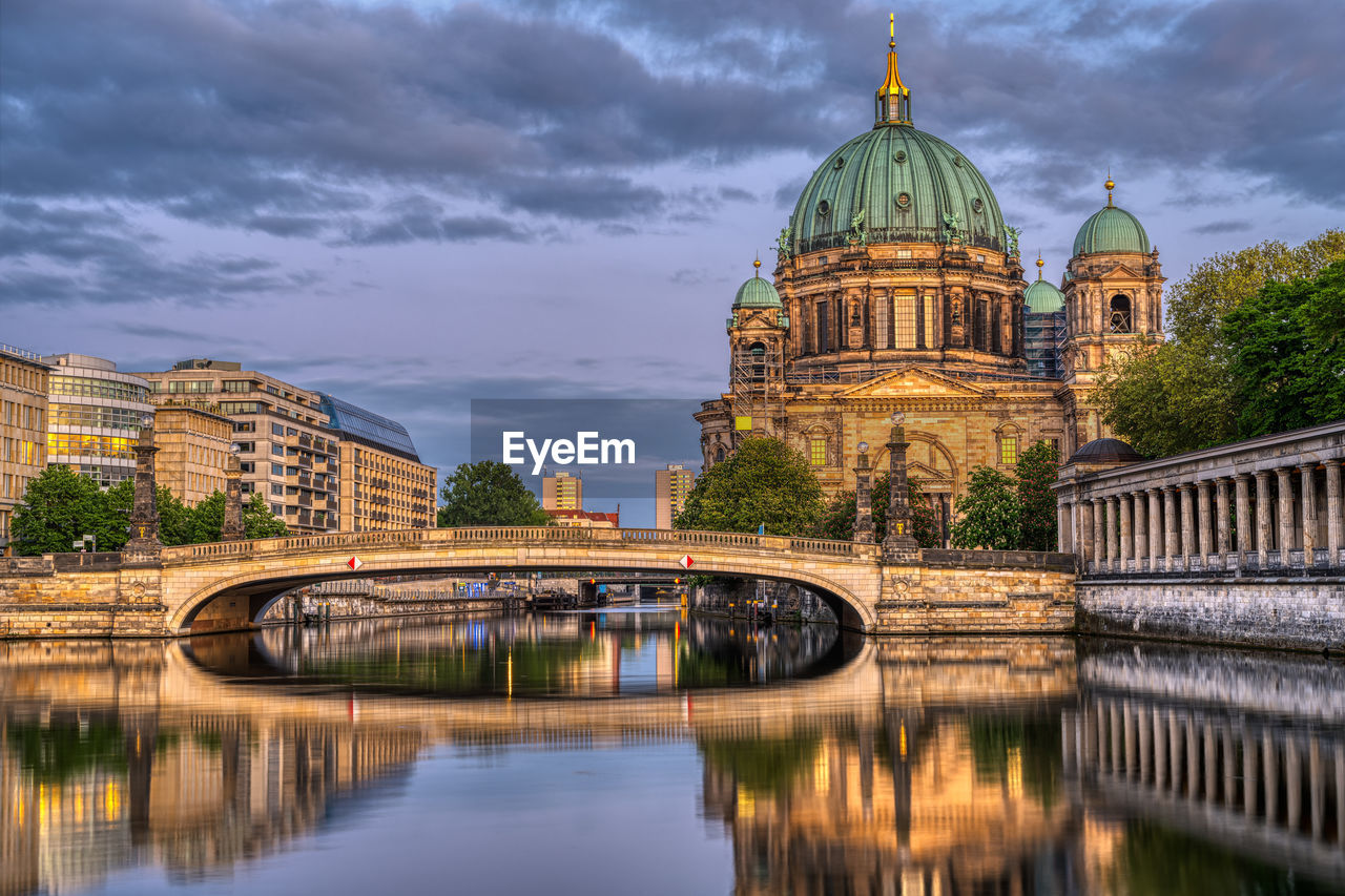 The berlin cathedral, the museum island and the river spree at dusk
