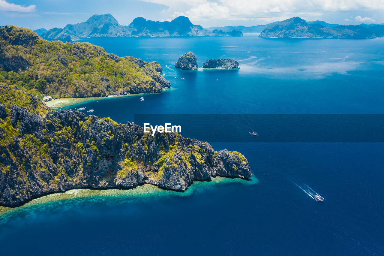 SCENIC VIEW OF SEA AGAINST BLUE SKY