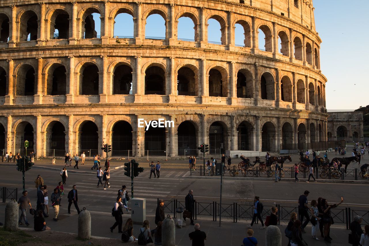 Group of people in front of historical building