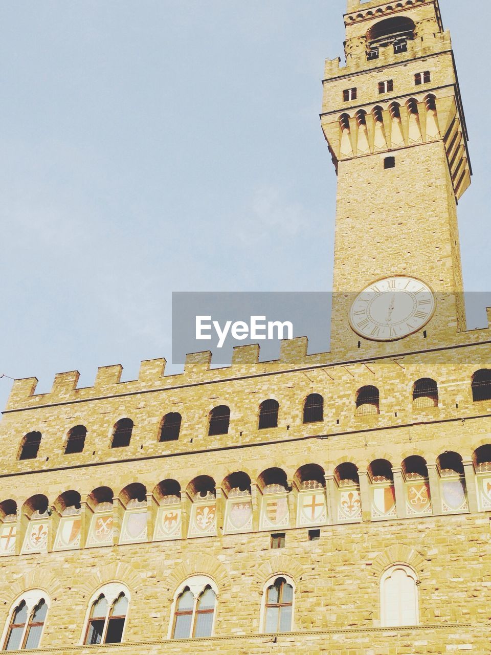 Tower of palazzo vecchio against clear sky