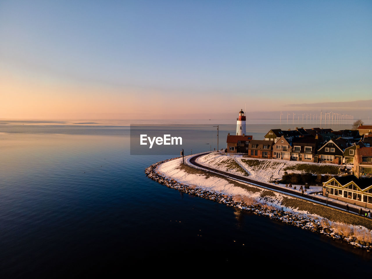 PANORAMIC VIEW OF SEA AGAINST SKY DURING SUNSET