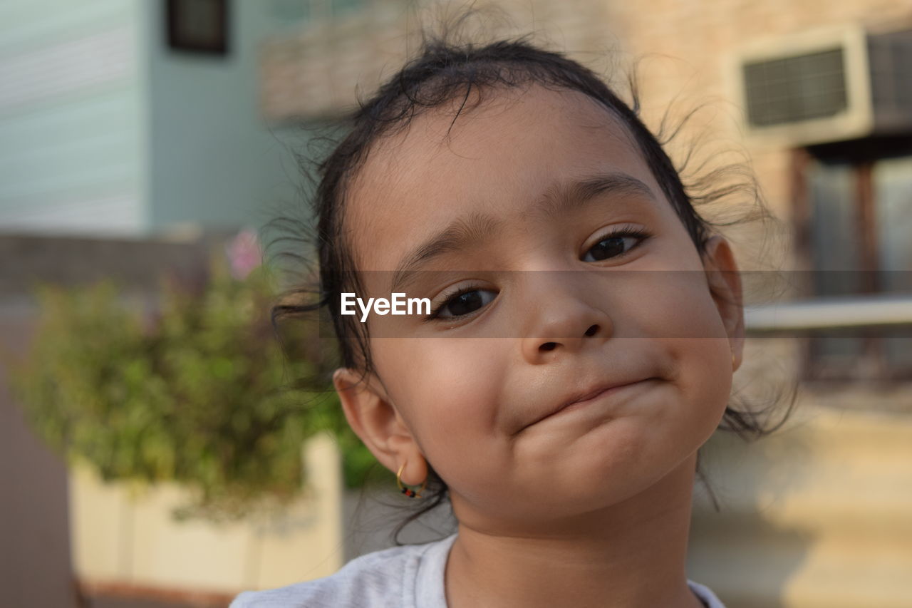 Close-up portrait of cute girl