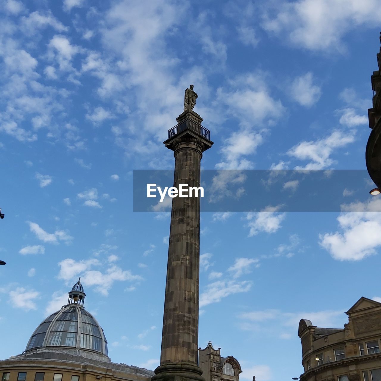 Low angle view of earl grey column against sky