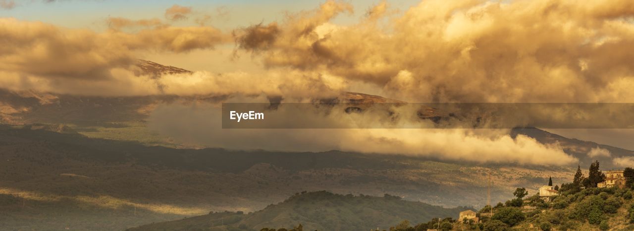 Panoramic view of mountains against sky