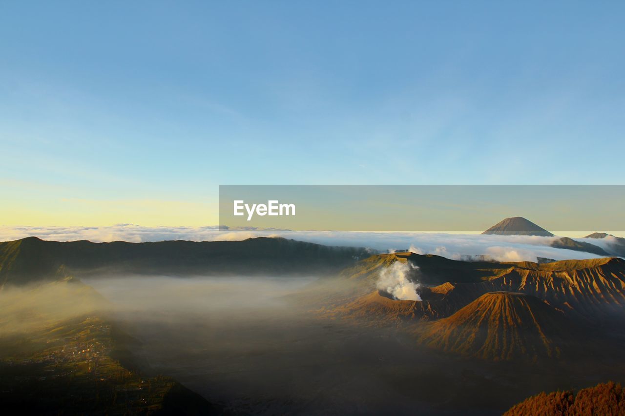 View of volcanic landscape against sky