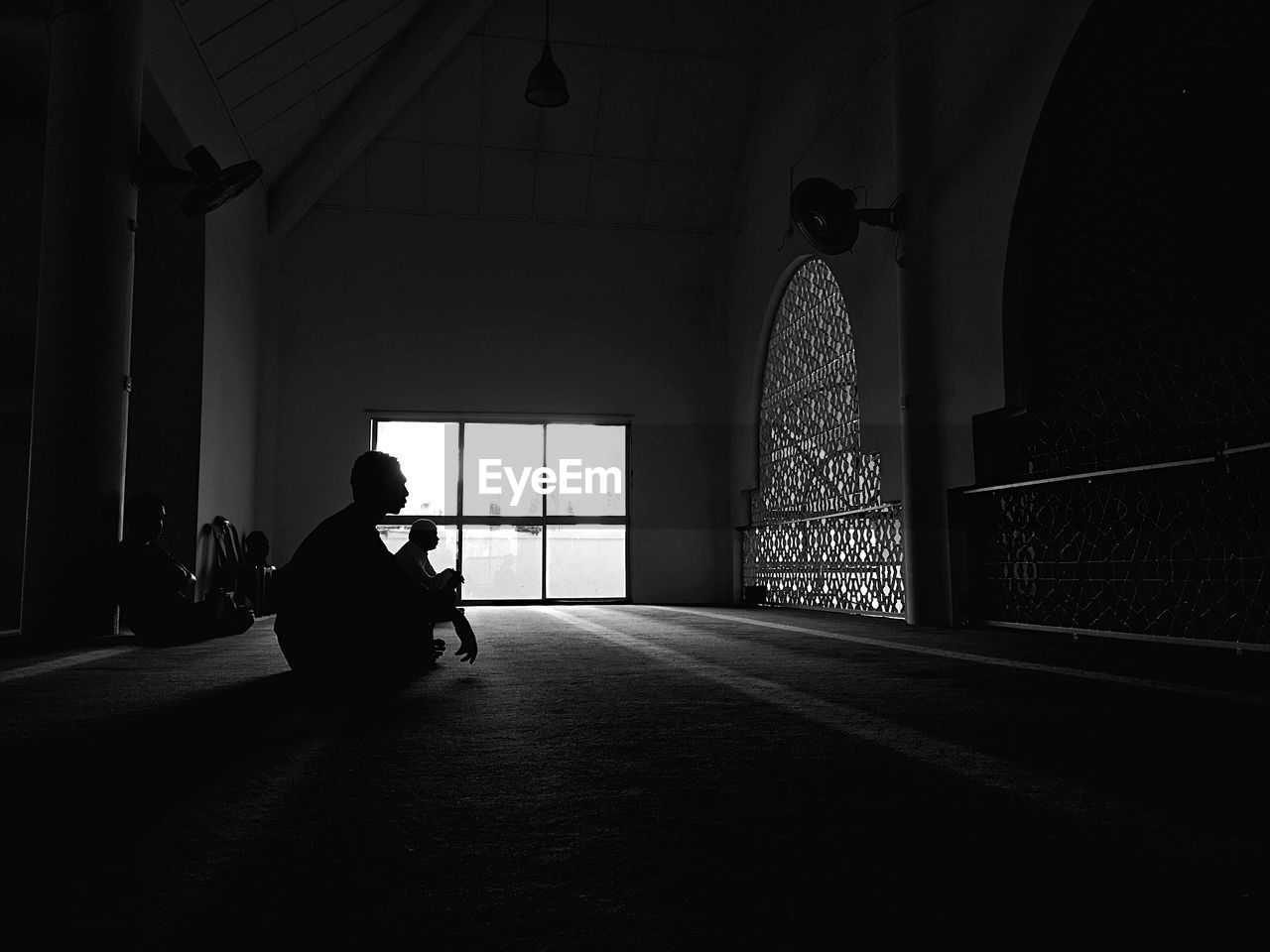 Men worshipping in mosque 