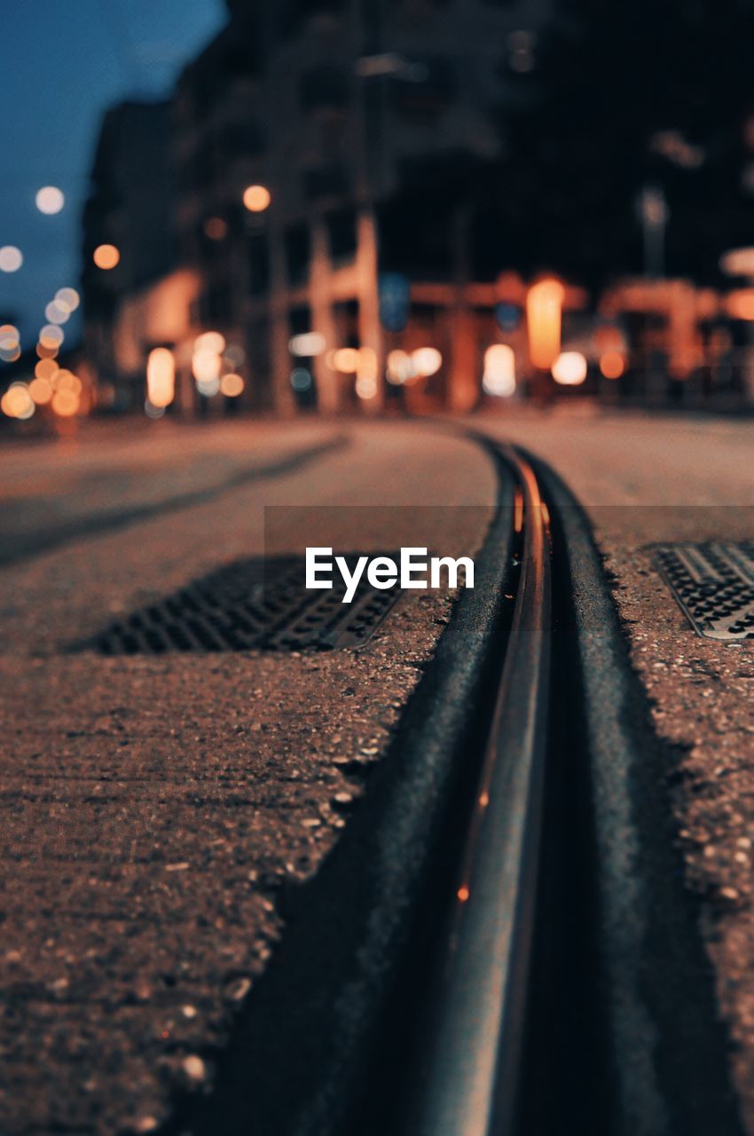 Surface level of railroad tracks at night