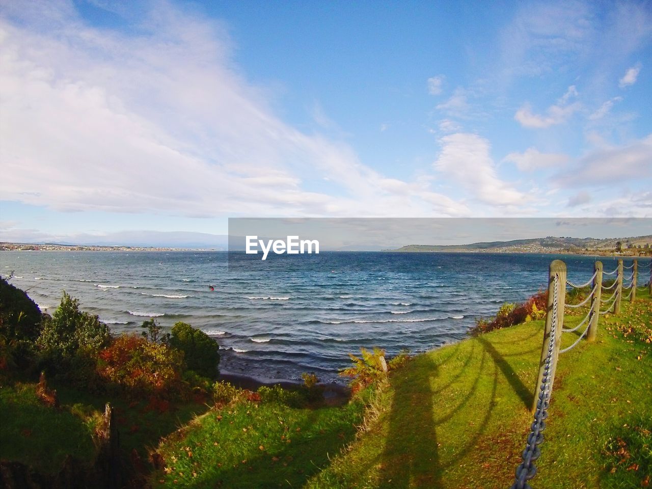 Scenic view of sea against blue sky