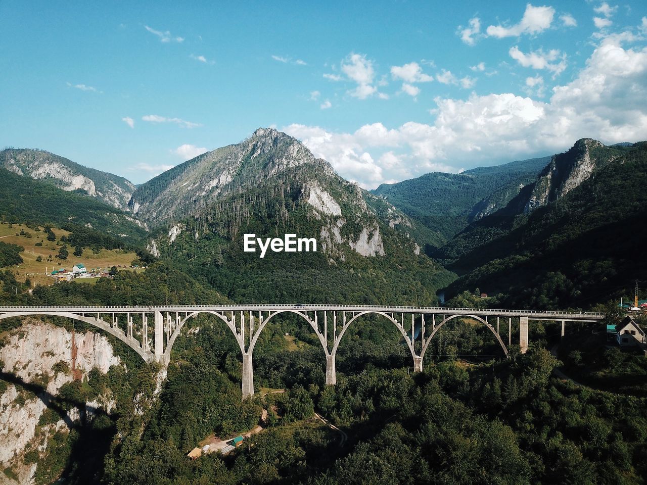 Bridge over river against sky