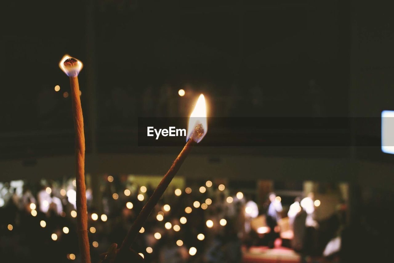 Close-up of illuminated candles